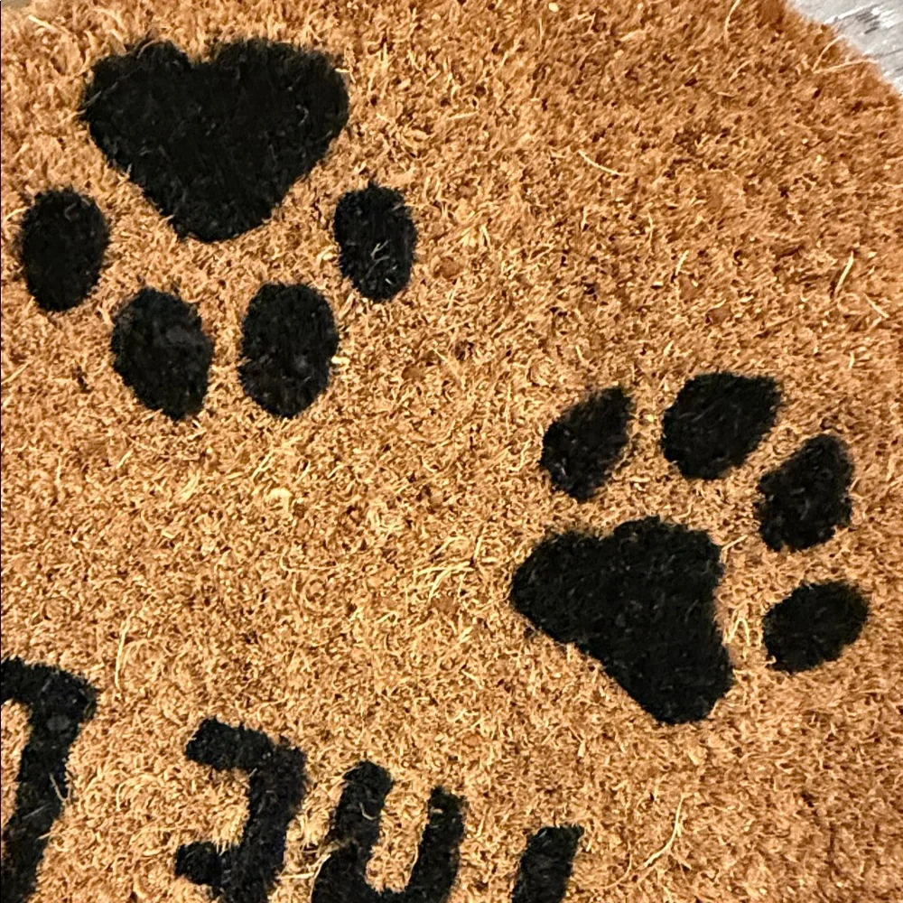 Mud Pie Bone-Shaped Doormat in Brown with Black Paw Print